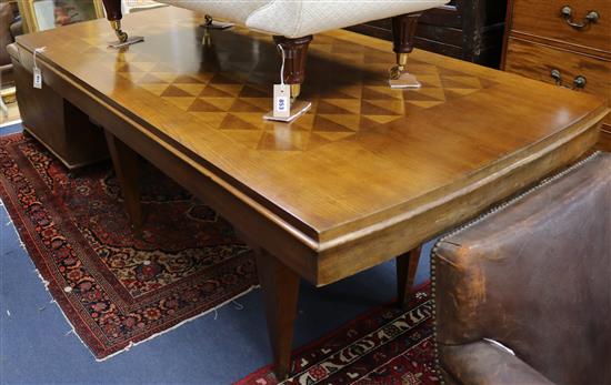 An Art Deco parquetry topped dining table W.182cm